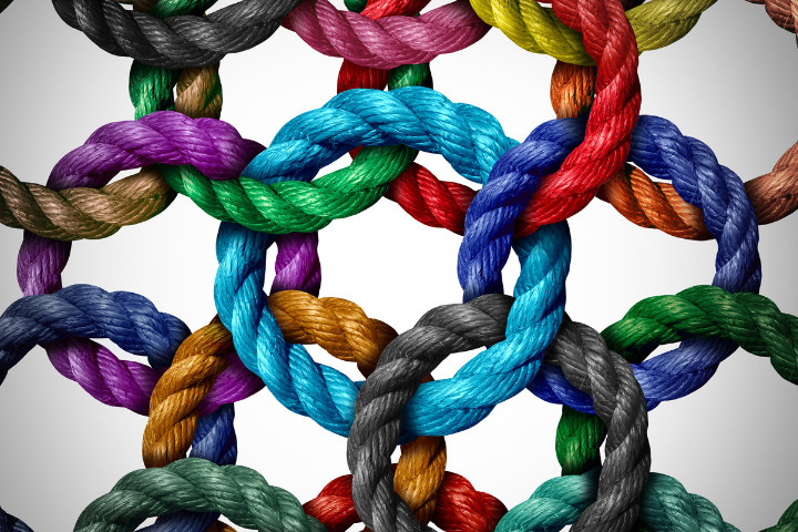 Why companies should have a CSR strategy - interlink colourful ropes that over lap.