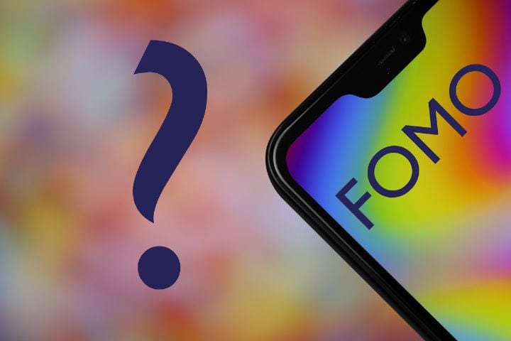 FOMO and the Impact on Marketing Strategies a phone screen with FOMO on it. on the other side of the graphic is a large question mark.