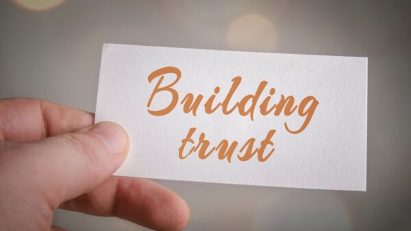 a piece of paper reading building trust in media coverage