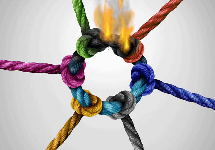 marketing budget - colourful ropes tied together in a securely interwoven circle, but one link in on fire, representing the fact that if you don't know what your competitors are doing you have a weak link in the strategy chain.
