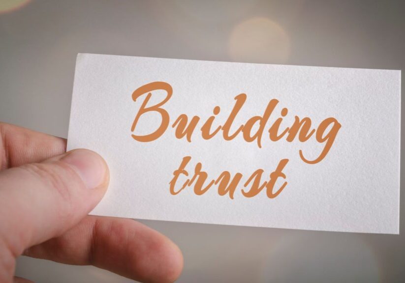 a piece of paper reading building trust in media coverage