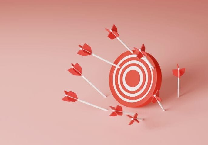 Target with darts hitting the bullseye, marketing strategy concept, NAMA branding.