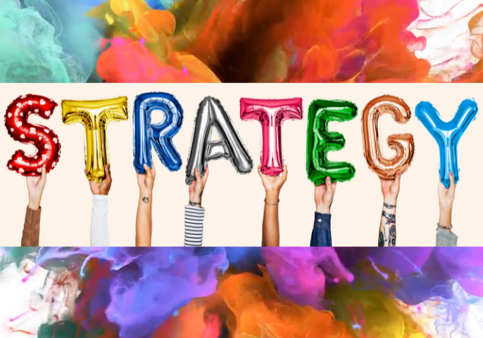 Things to consider when writing an integrated marketing strategy - the word strategy spelled out in foil helium balloons in different colours held up by hands.